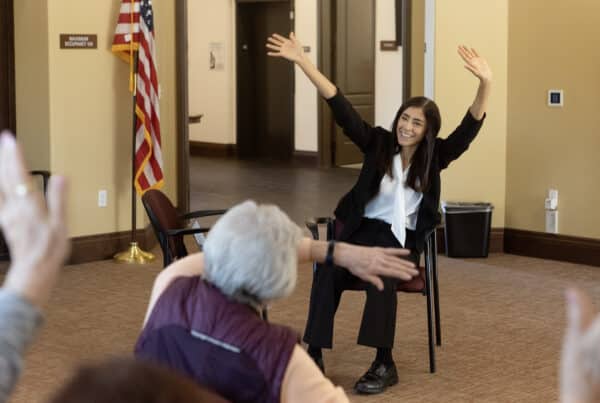 Woman teaching exercise class